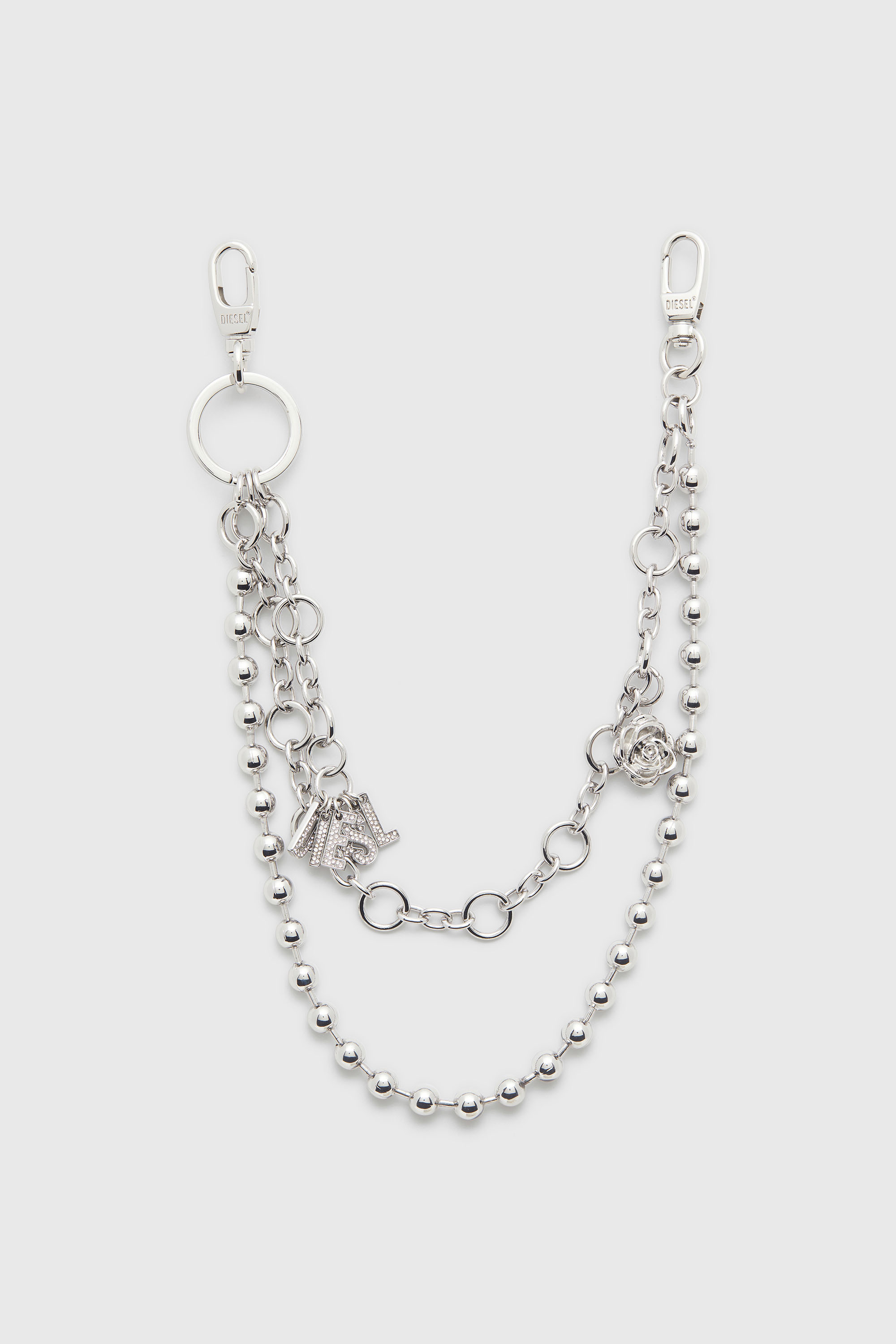 Metal charm with chains and pendants