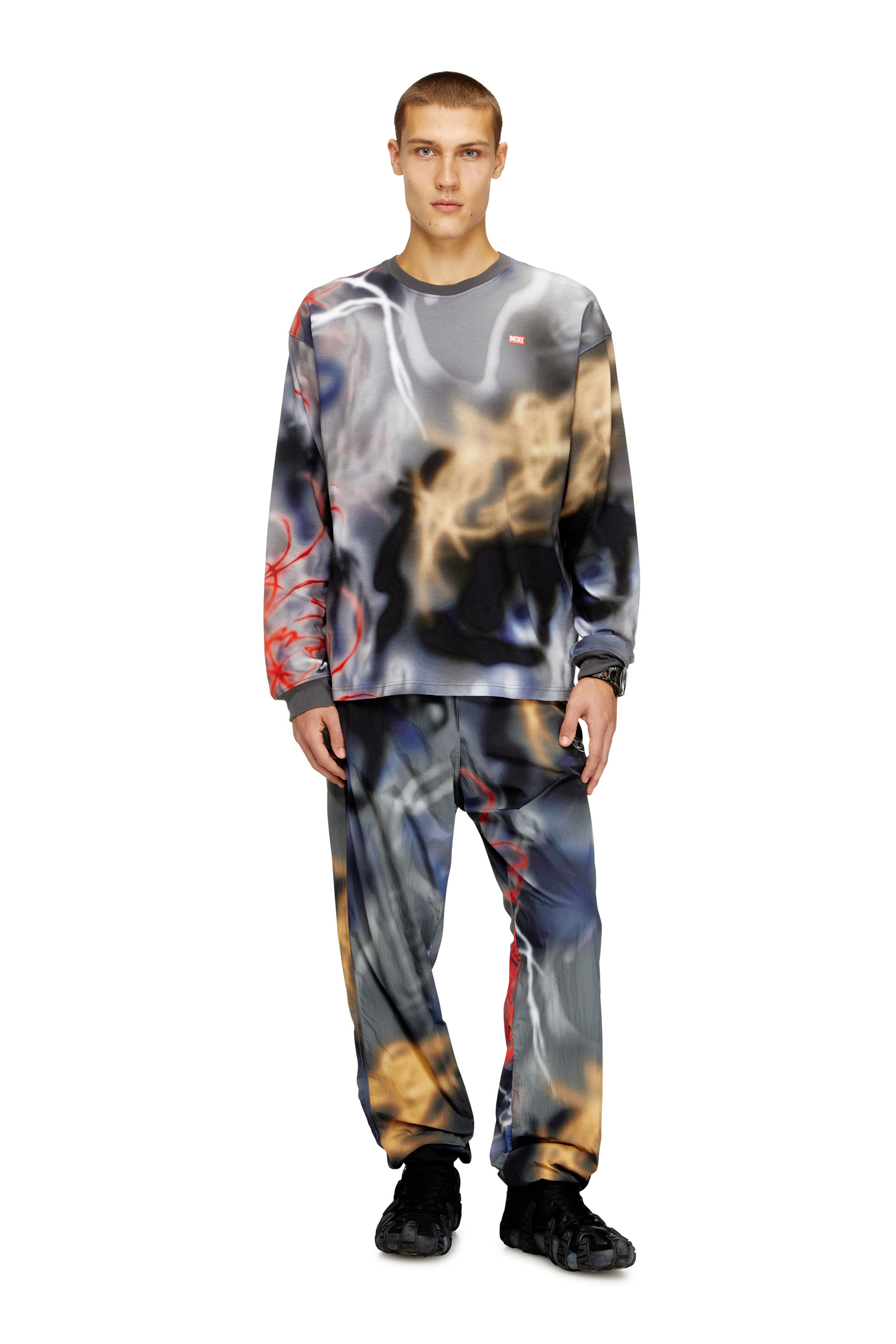 Diesel - P-ARELION, Man's Nylon pants with all-over print in Black/Blue - 1